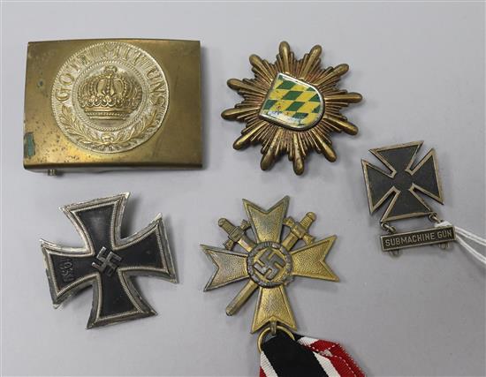 Five assorted medals/badges including German Submarine Gun cross and two other German crosses.